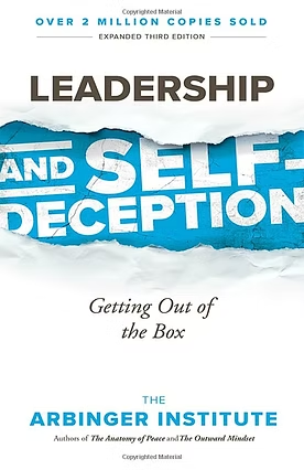 Book cover of "Leadership and Self-Deception: Getting Out of the Box" by The Arbinger Institute, blue and white torn-paper design