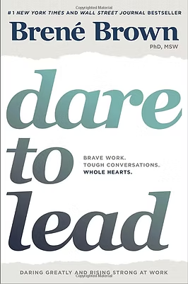 Book cover of "Dare to Lead" by Brene Brown, with teal and navy typography on a white background