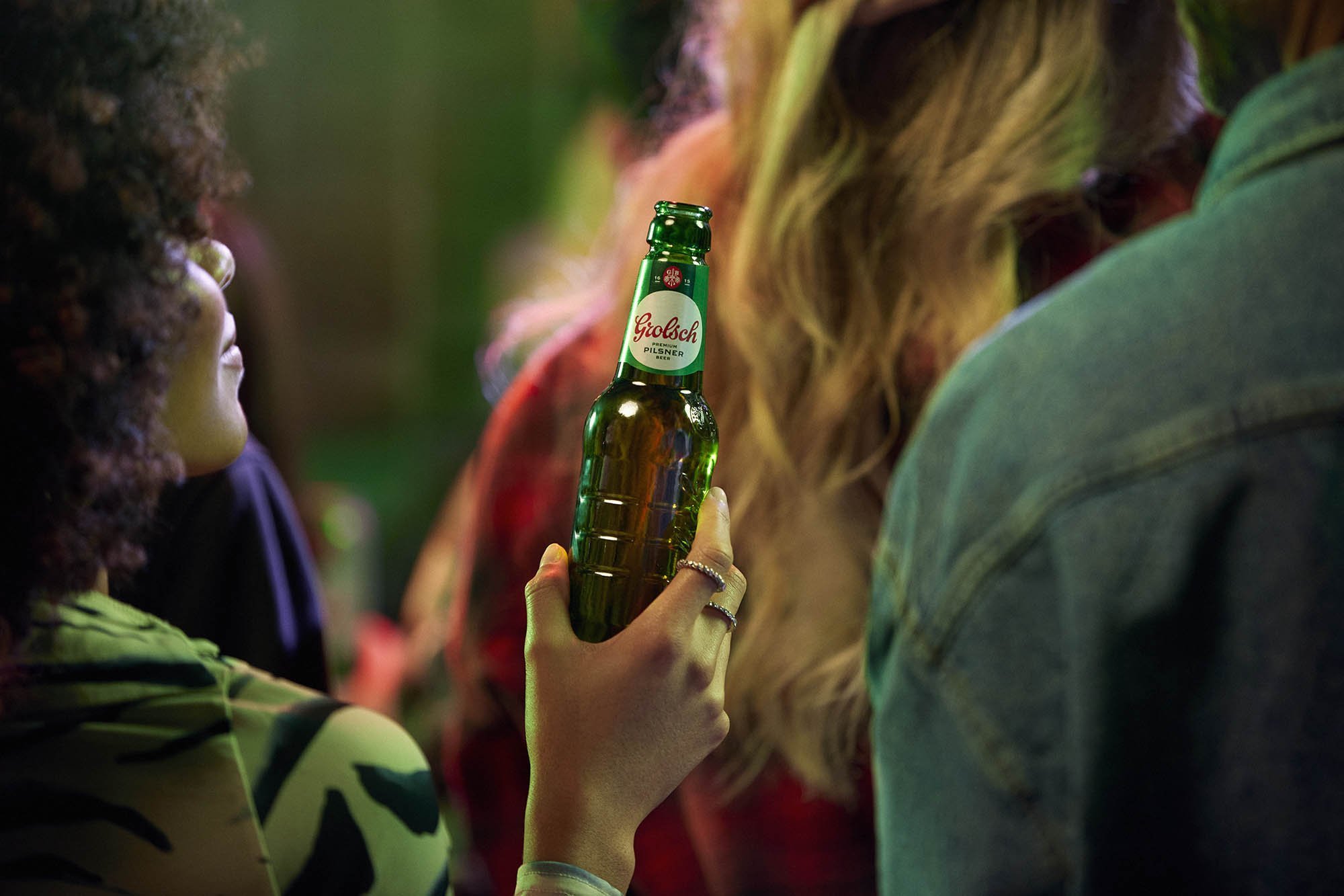 A close up of a bottle at a music venue in this lifestyle image by Jon Enoch
