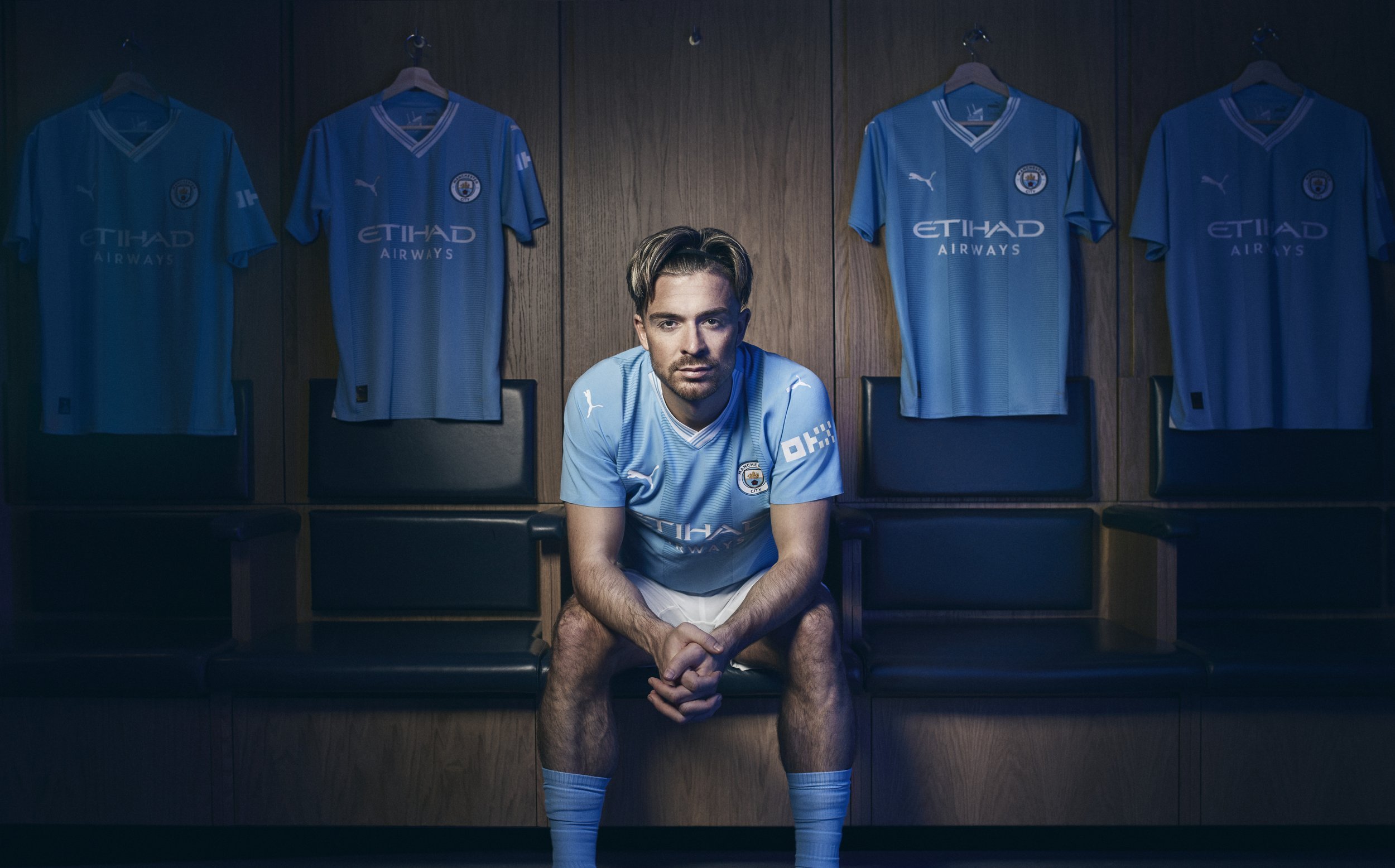 Manchester City and England footballer Jack Grealish photographed in the club dressing room for the OKX My Fabric campaign.