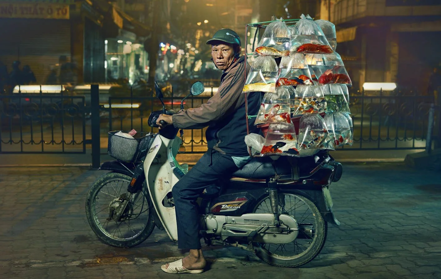 Advertising photographer Jon Enoch’s latest project ‘Bikes of Hanoi’ showing motorbikes carry goods around the city of Hanoi, Vietnam.