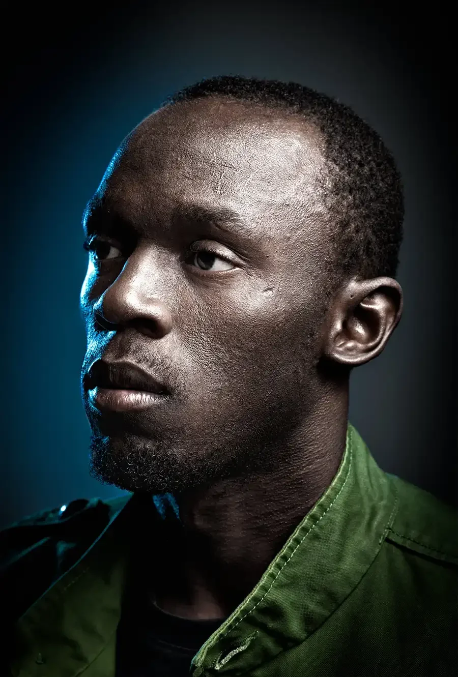 Olympic champion and world record holder Usain Bolt captured in a dramatic portrait that highlights the confidence, focus and presence of one of the most recognisable athletes in sporting history.