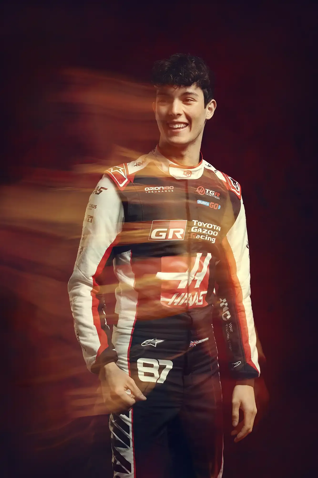 Sports advertising portrait of Haas F1 Team driver Oliver Bearman photographed for a motorsport marketing campaign.