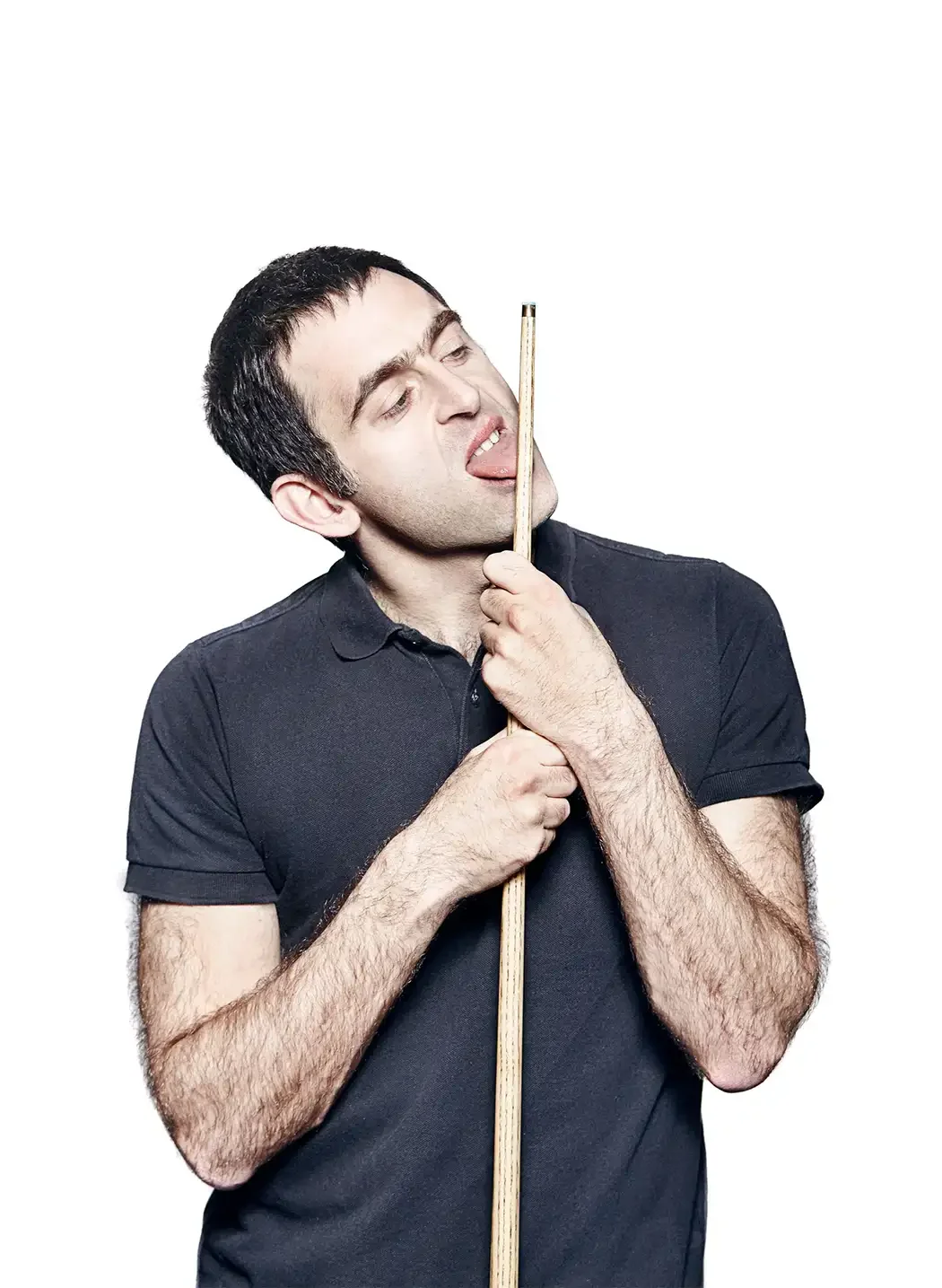 Ronnie O'Sullivan, multiple-time World Snooker Champion, photographed in a playful portrait that reflects the personality, confidence and natural talent that have made him one of the sport's most influential figures.