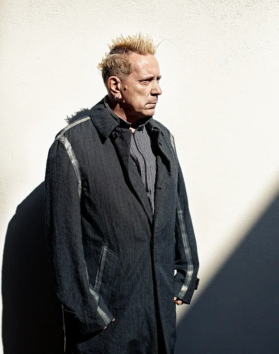John Lydon, frontman of the Sex Pistols and Public Image Ltd, photographed in a bold portrait that reflects the attitude, individuality and enduring influence of one of Britain's most iconic musicians.