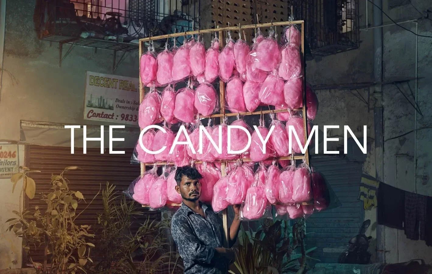 Documentary portrait project photographed on the streets of Mumbai, India. The series focuses on candy floss vendors and explores themes of entrepreneurship, identity and everyday life through vibrant character-led portraits.