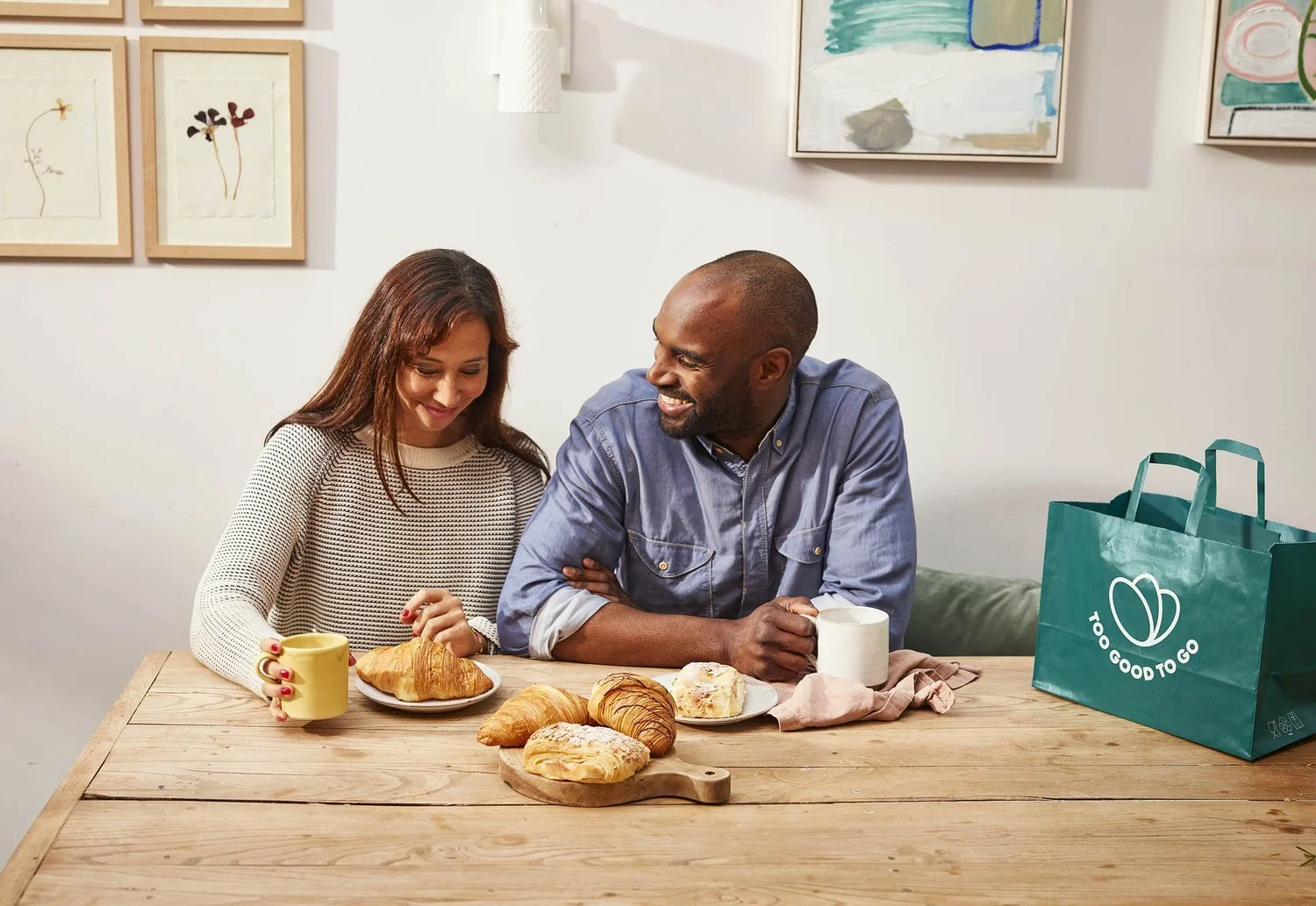 A couple are pictured chatting at their breakfast table in this lifestyle image by London based photographer Jon Enoch