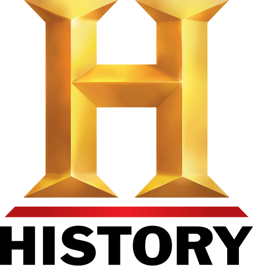 A golden, stylized gaming console resembling the Nintendo 64, with a large, central slot and a red base.