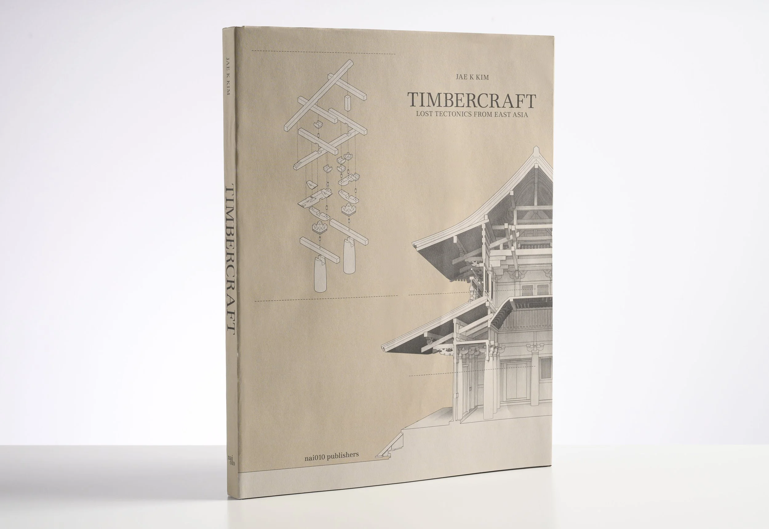 Book titled 'Timbercraft' with illustrations of traditional East Asian wooden architecture and construction details on the cover.