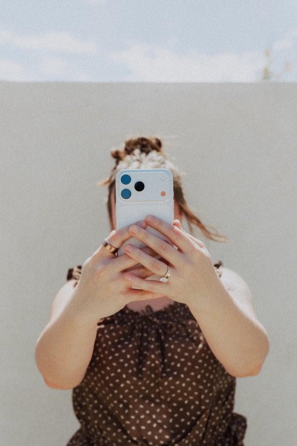 Filming social media content on a phone for a client