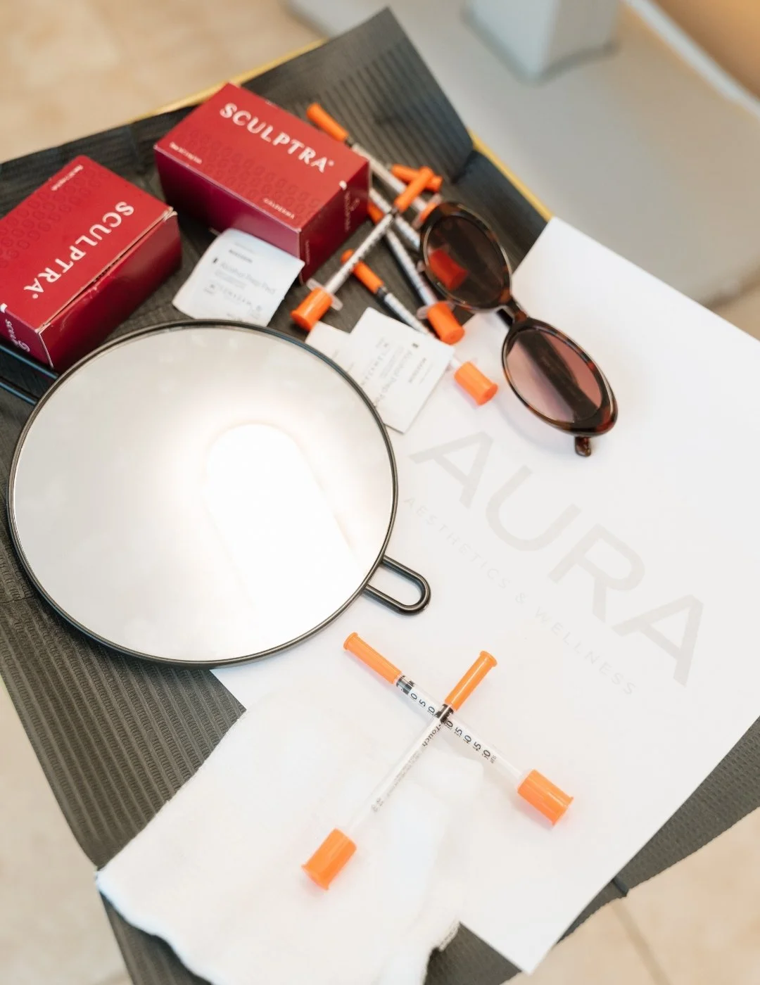 Medical aesthetics treatment setup at Aura Aesthetics & Wellness