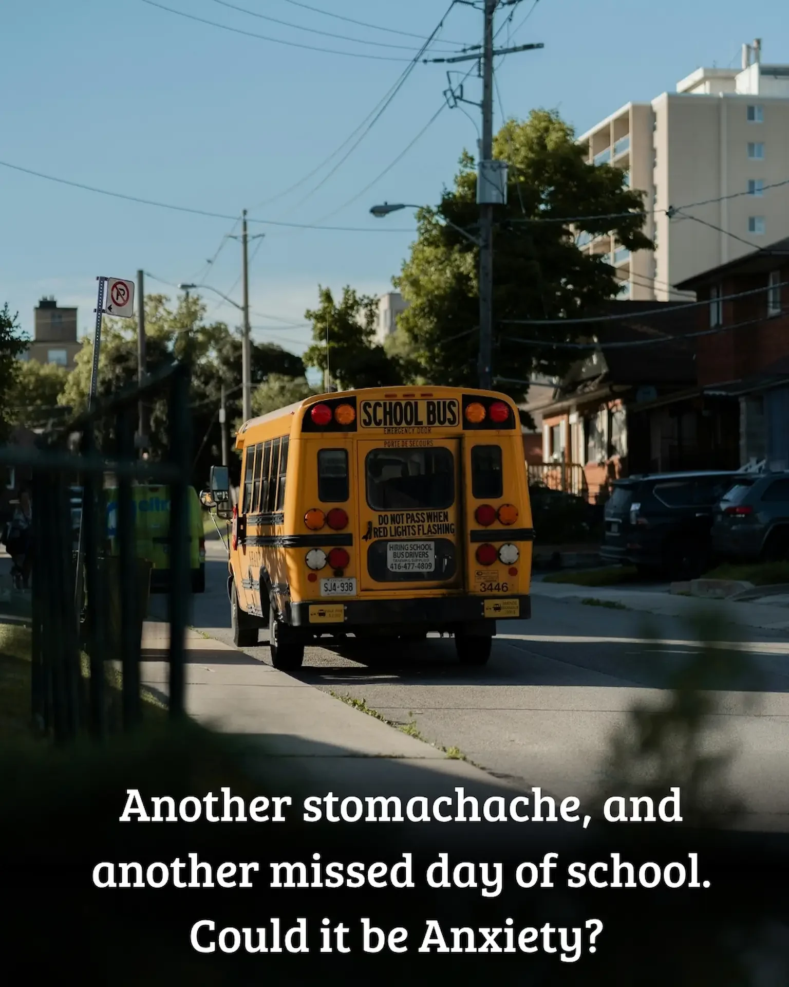 school bus driving away due to school anxiety causing absence. text stating "another stomachache and another missed day of school. could it be anxiety?"