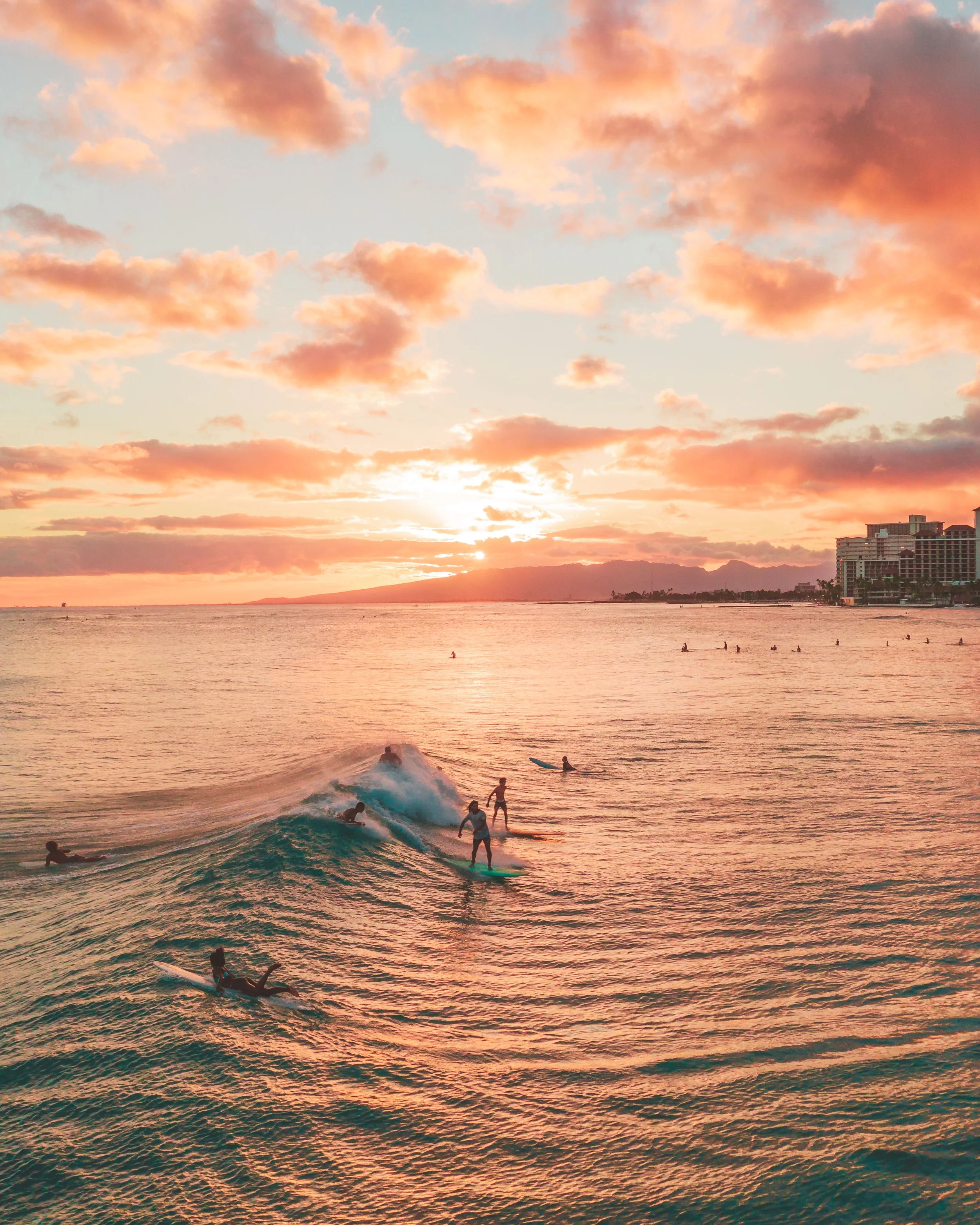 surfing during sunset