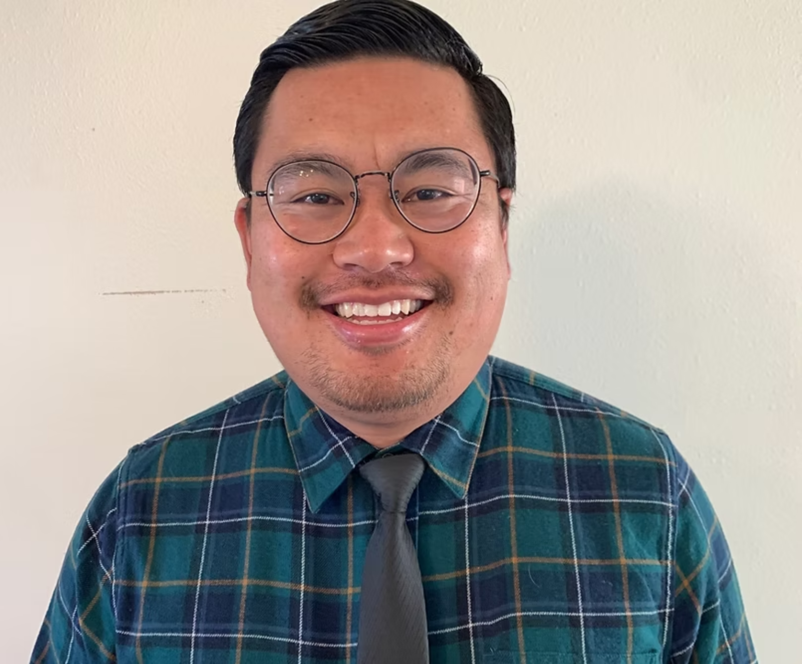 Headshot of Kayi Pfoze, pastor at Laramie FUMC