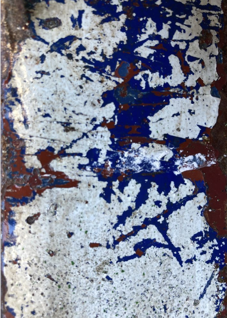 Paint Layers - Layers of paint, worn away or scratched show the underlying colours.