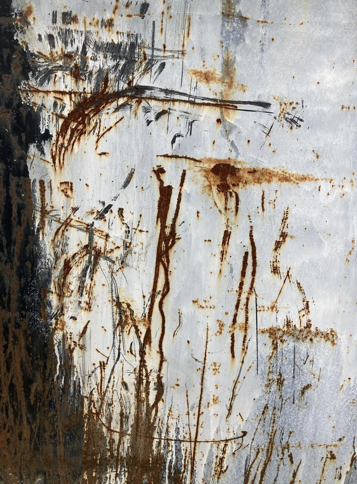 Scratches - A dark scratched metal surface in browns and greys revealing the layers of paint.