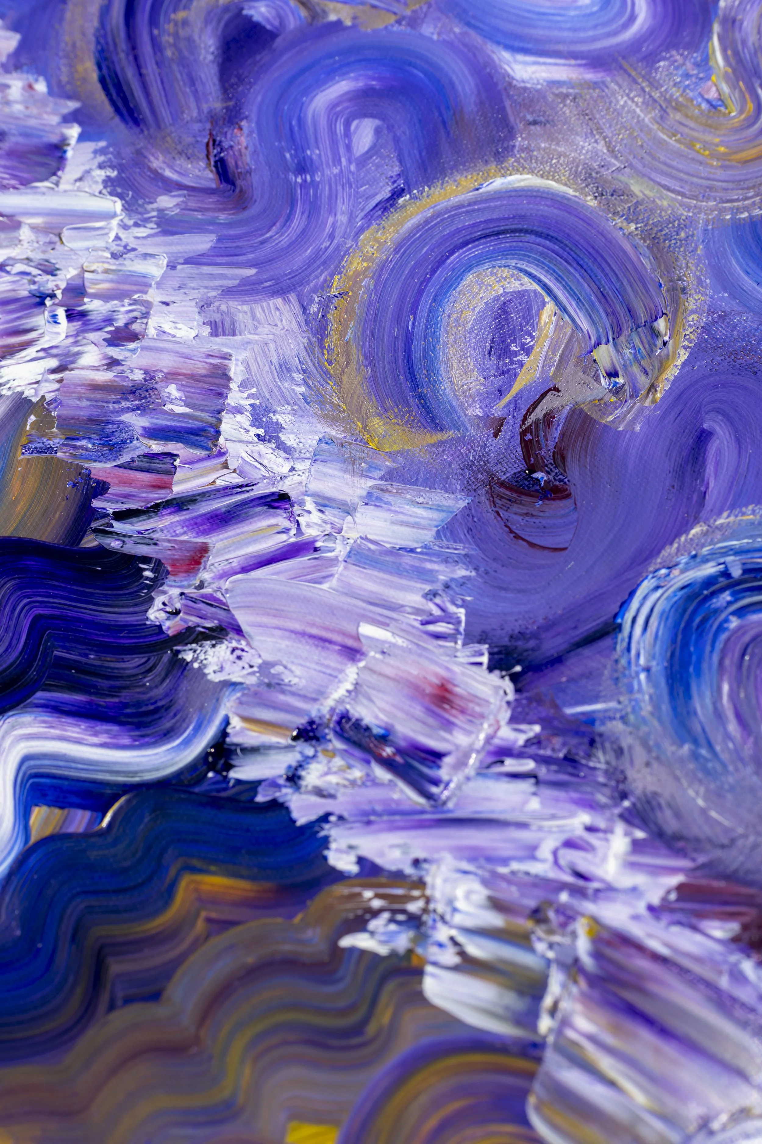 Close-up of an abstract painting with swirling strokes of purple, white, gold, and hints of red and blue paint.