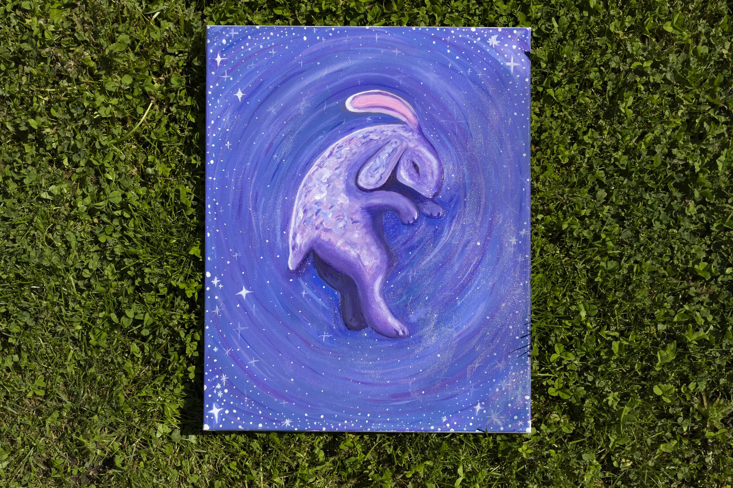 A painting of an elephant with a cosmic, galaxy-like background featuring stars and swirling patterns in shades of blue and purple.