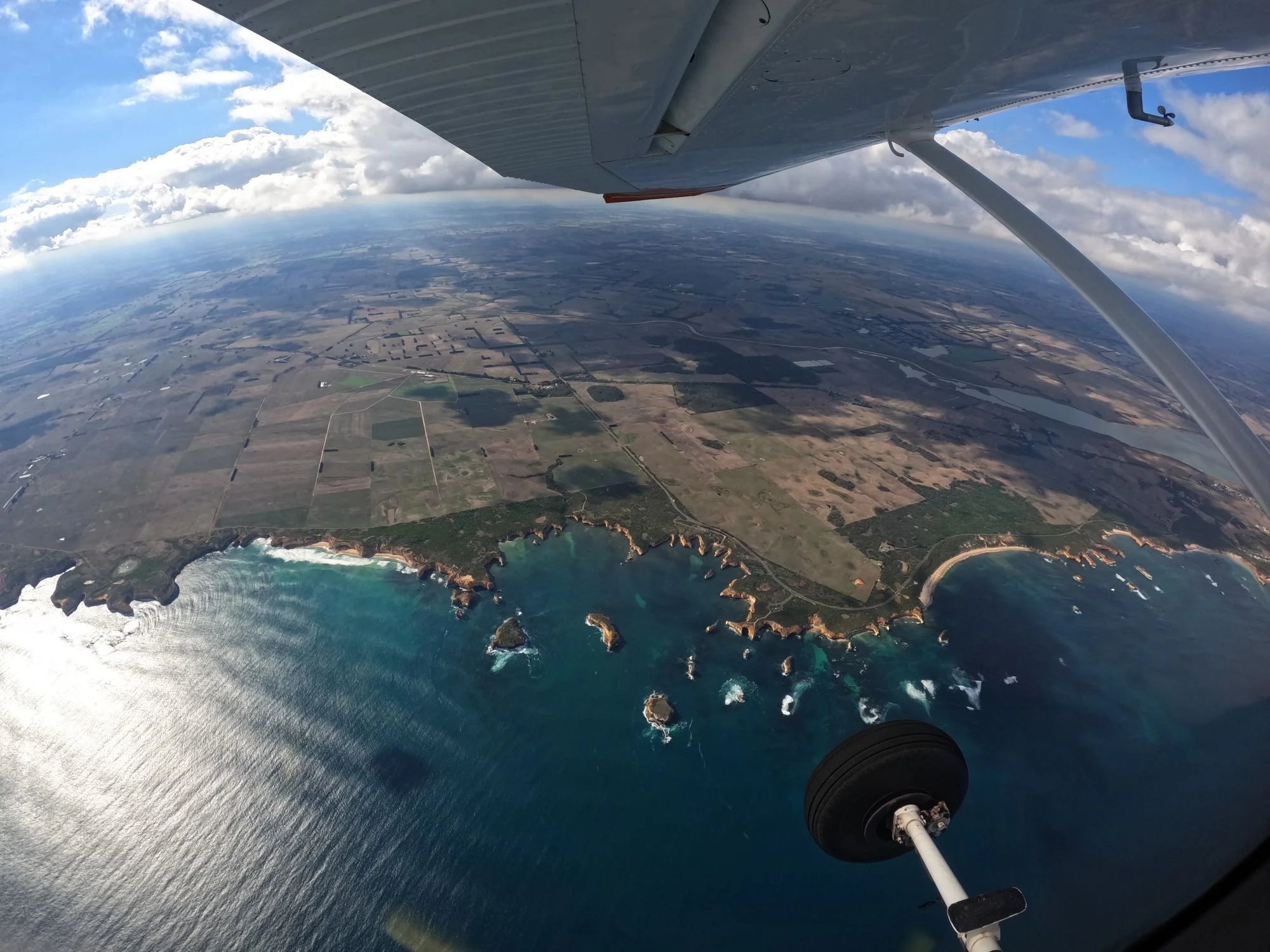 Aerial view of the Shipwreck Coast sea stacks from the skydiving plane