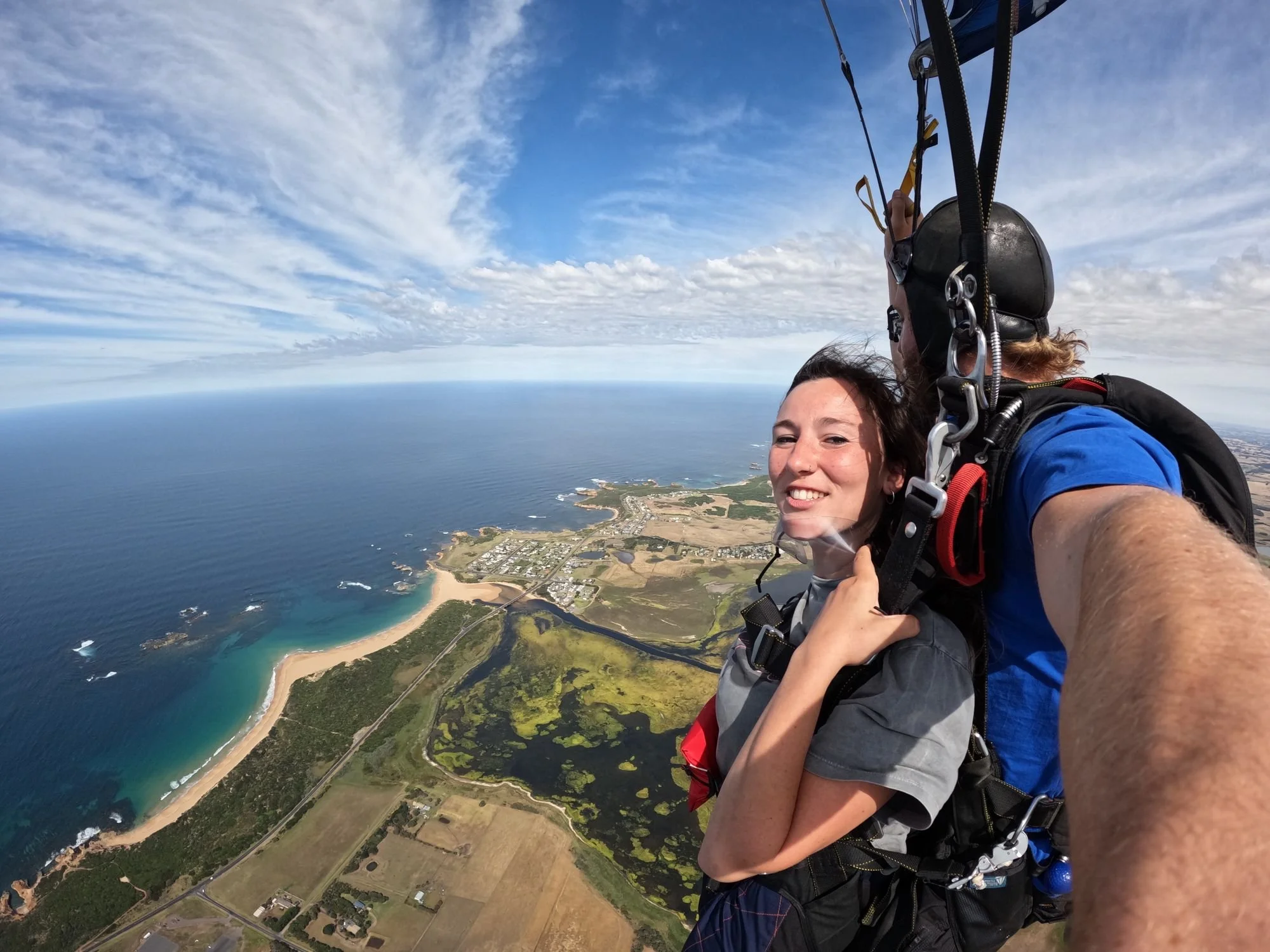 Tandem skydiver under canopy above Peterborough and the Shipwreck Coast