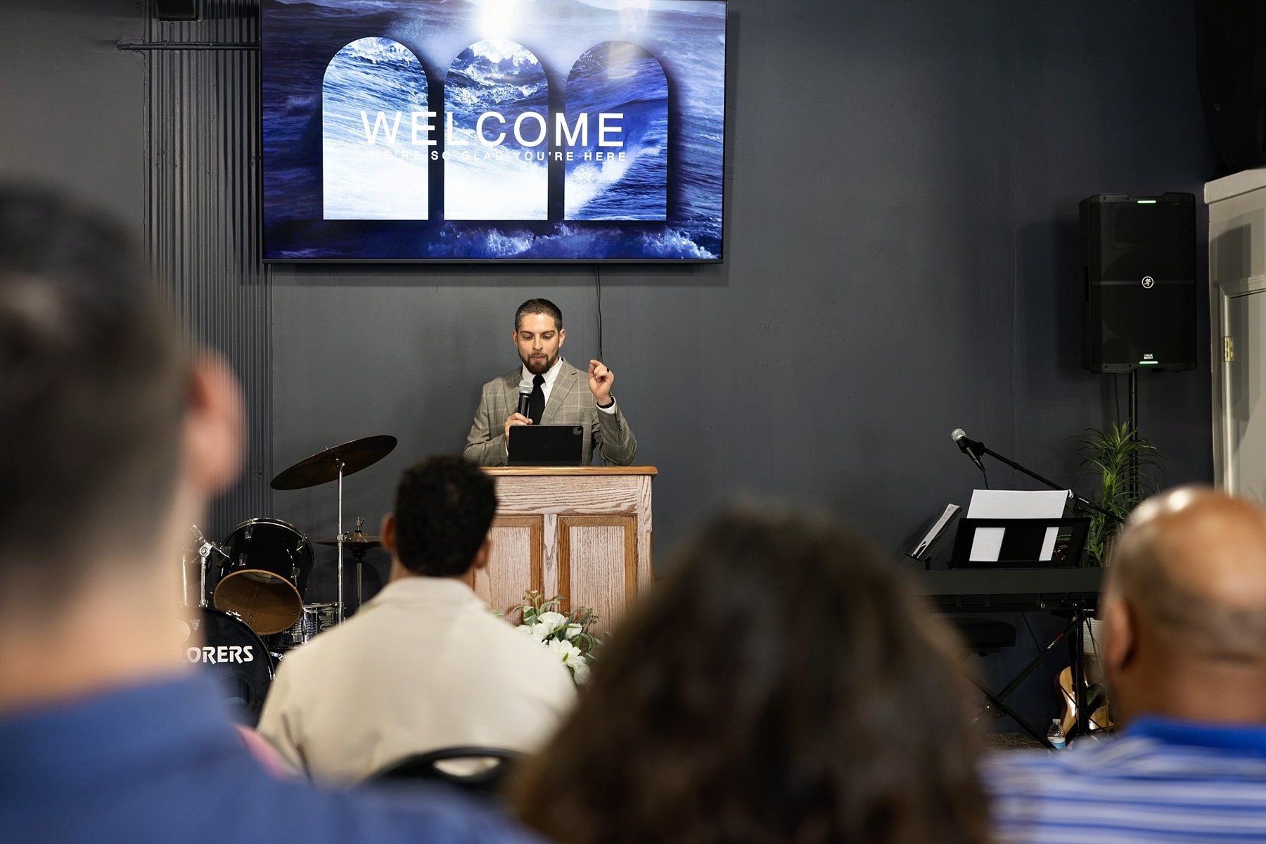 Pastor Eddie Gutierrez preaching during a Sunday service at Door Church KC in Blue Springs, Missouri.