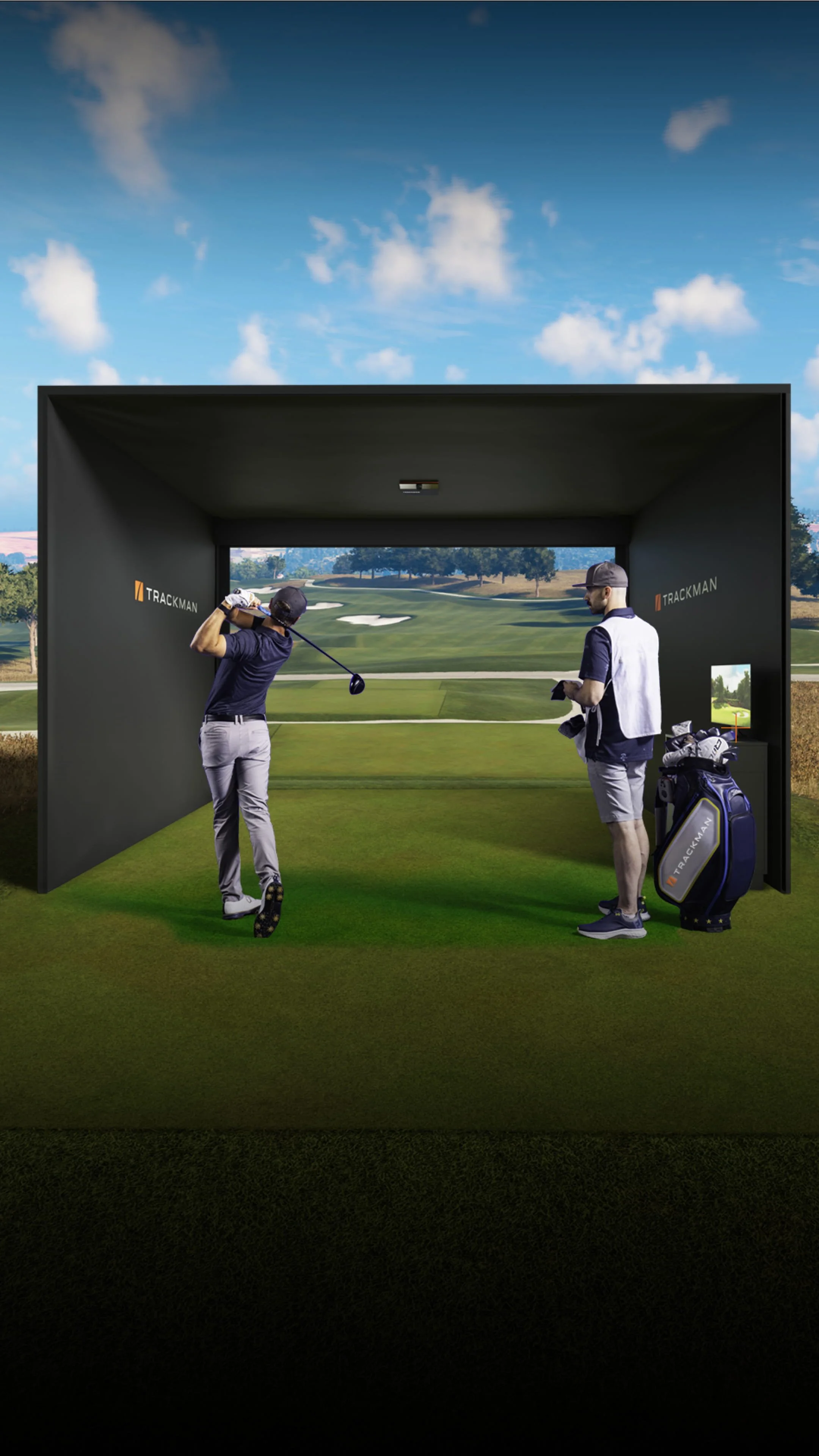 man playing golf on trackman simulator with instructor