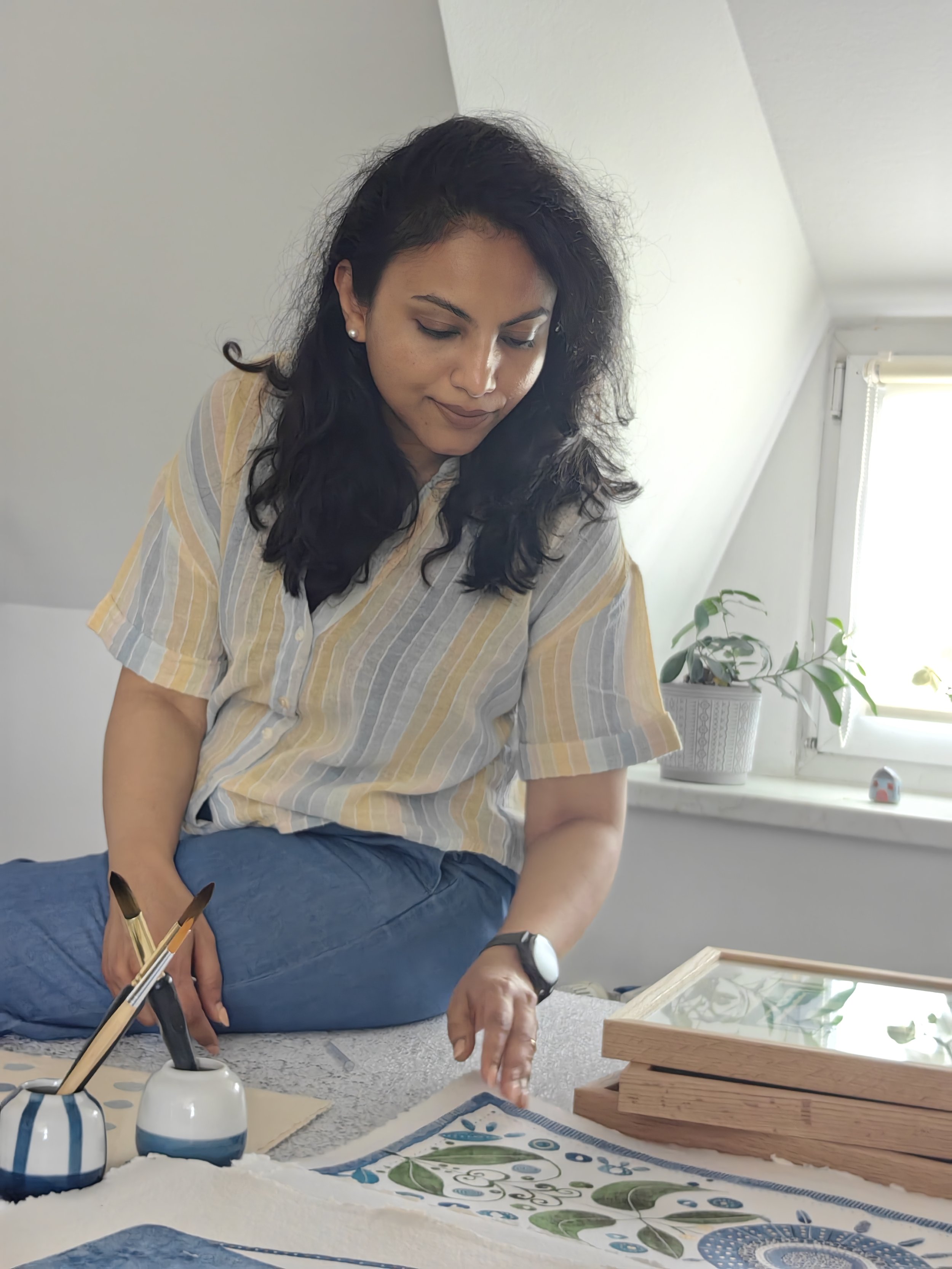 Asha Rodrigues Artistry -  creative activity at a table with watercolor