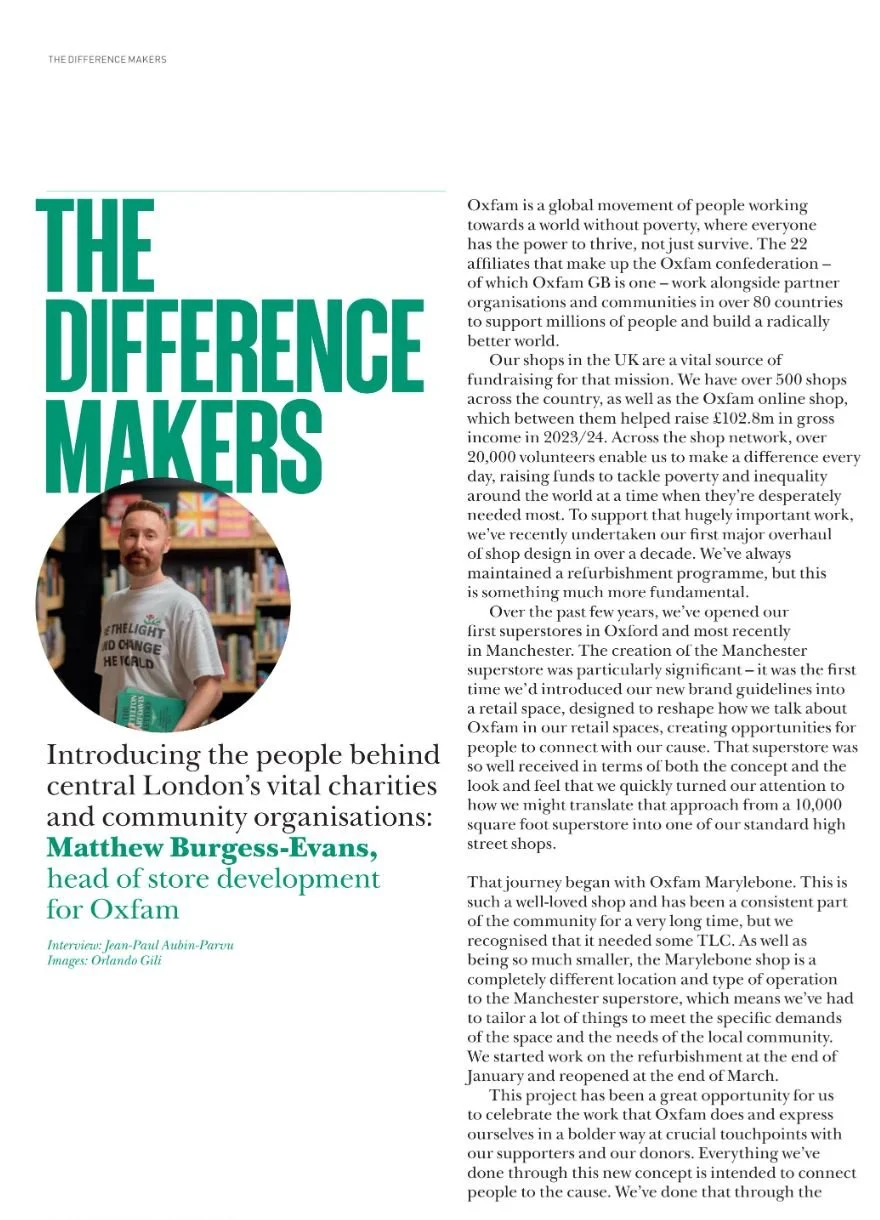 Article page titled 'The Difference Makers' featuring a photo of Matthew Burgess-Evans, head of store development for Oxfam, speaking about their charity work and store renovations.
