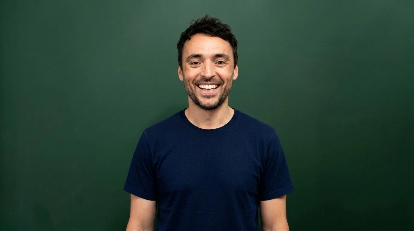 Headshot of smiling male strategist