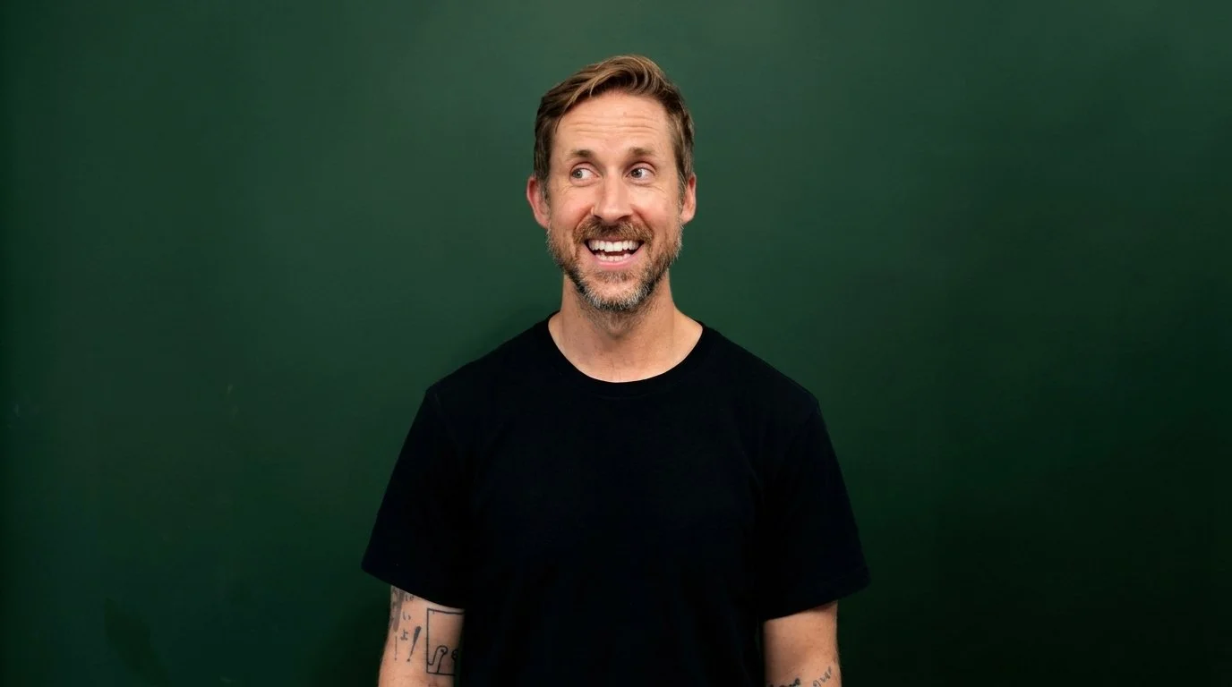 Headshot of smiling male director