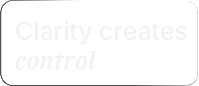 Text on a sign that reads "Clarity creates control" with a white background.