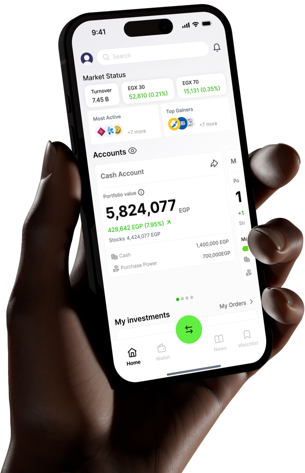 Close-up of a hand holding a smartphone displaying a financial investment app with account details, stock market data, and investment options.