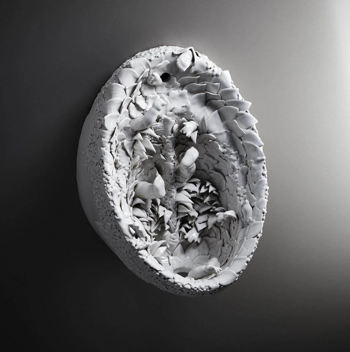 A white, abstract sculpture of a partially opened eggshell with intricate, textured, and layered interior details, set against a gray background.