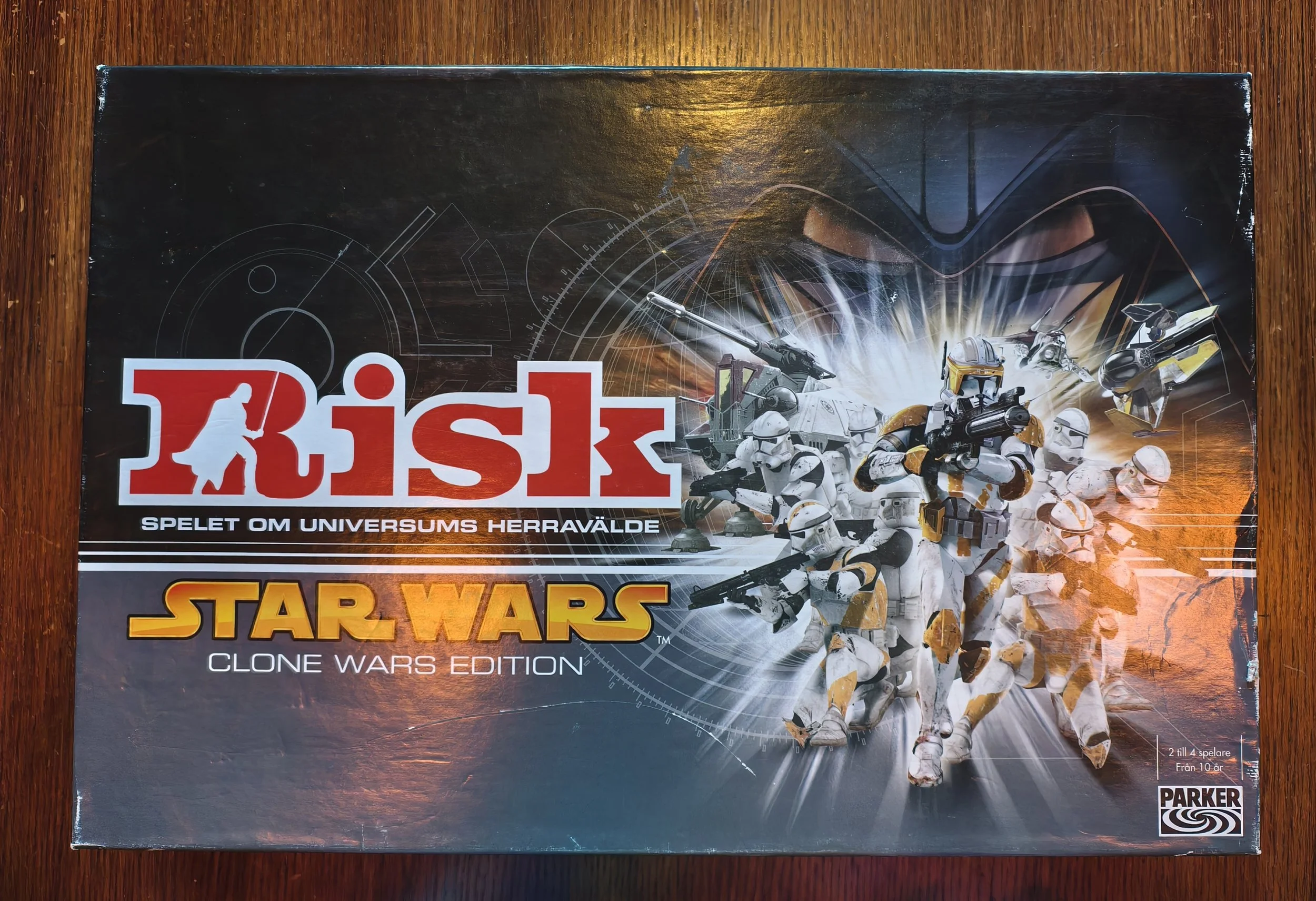 Star Wars Risk game box featuring clone troopers and starships in a space battle scene.