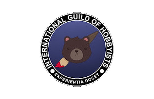 Logo of the International Guild of Hobbyists featuring a cartoon bear with a sword, surrounded by a circular border with the organization name and motto.