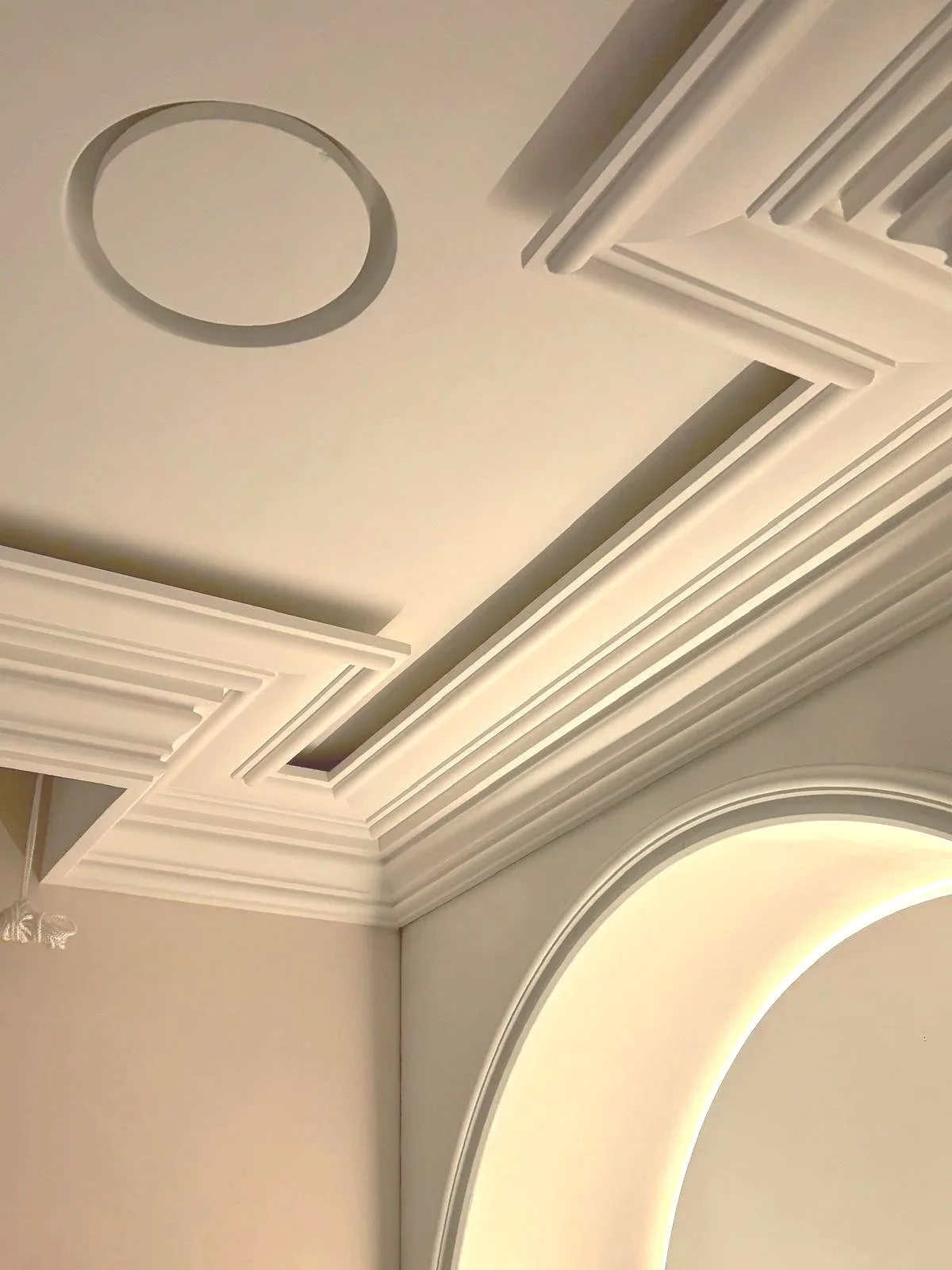 Ceiling with crown molding, recessed lighting, and a circular ceiling fixture.