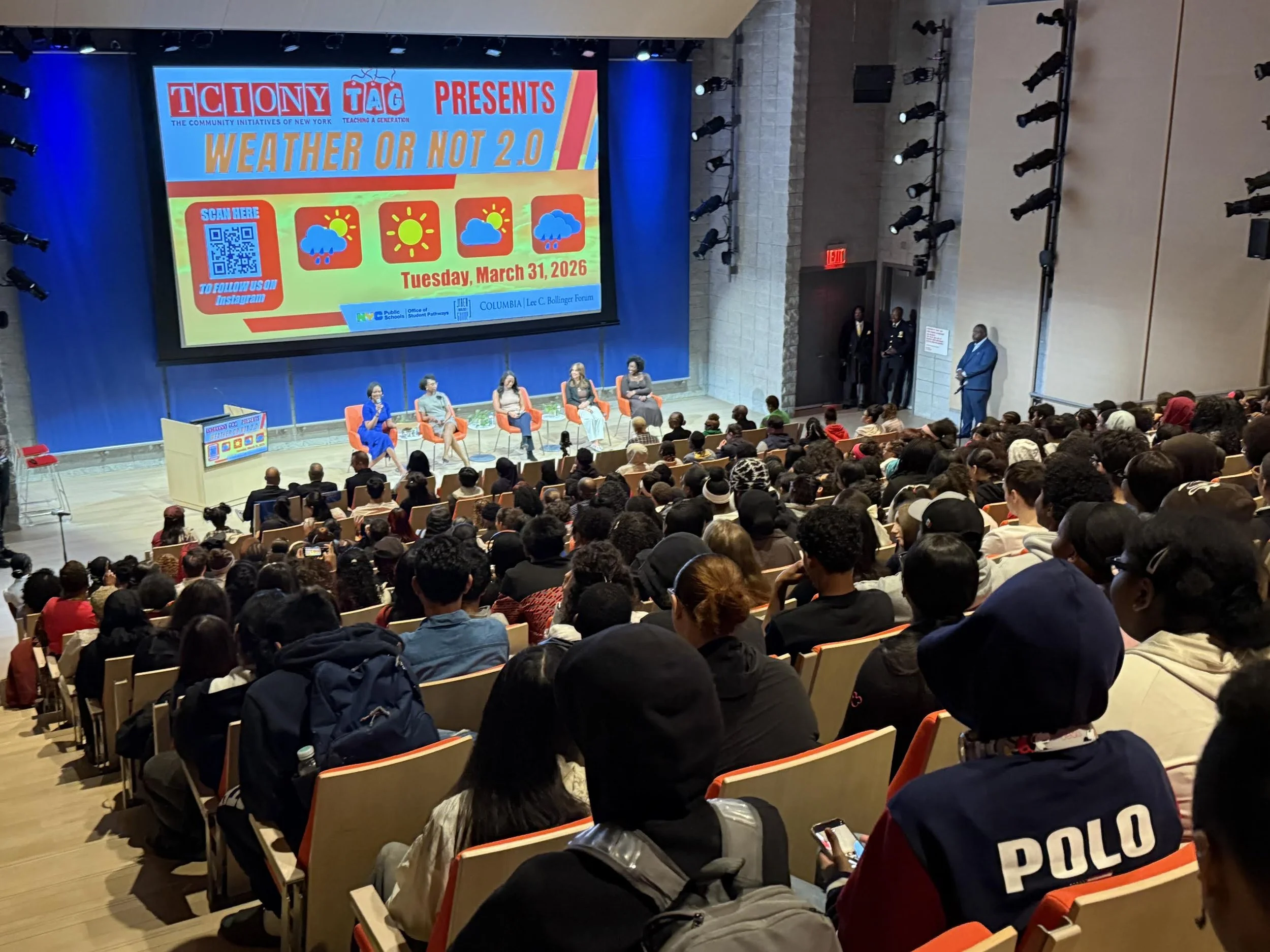Stacy-Ann Gooden speaking in front of  students and educating them.