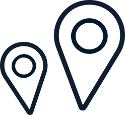 Icon of two map location pins, one filled and one outline, on a white background.
