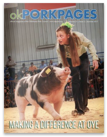 Cover of Oklahoma Pork Pages featuring a girl with a green hair bow showing a piglet at an animal show, with the headline "MAKING A DIFFERENCE AT OYE."