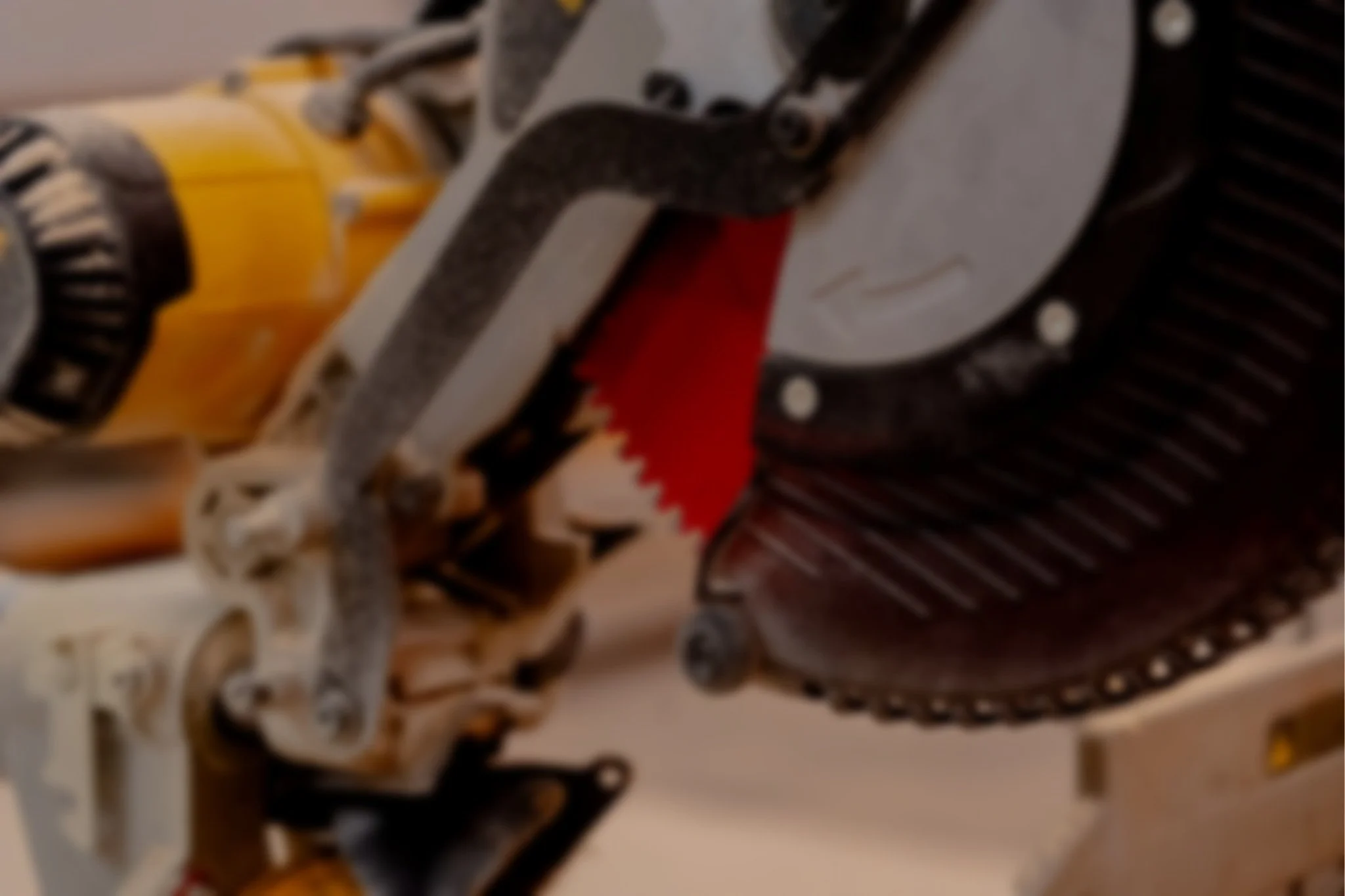 Close-up of skateboard wheels and trucks with skateboard deck visible.