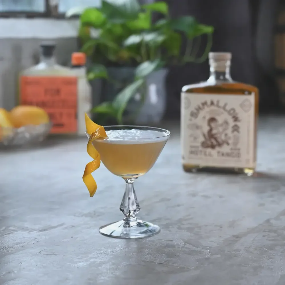 'Shmallow Dreamsicle made with Hotel Tango 'Shmallow Whiskey, garnished with an orange twist.