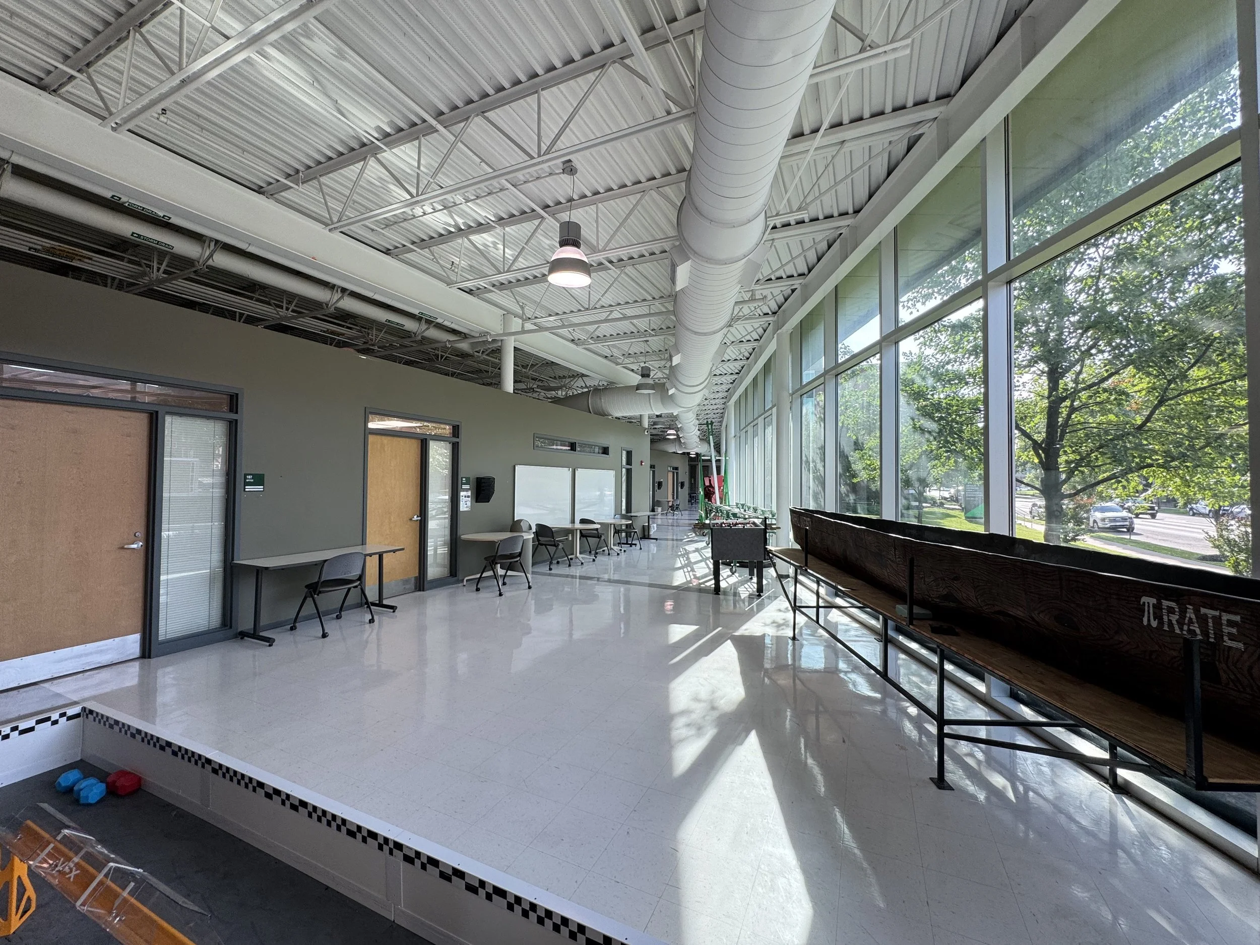 Open engineering laboratory with exposed ductwork, large windows and flexible instructional space.
