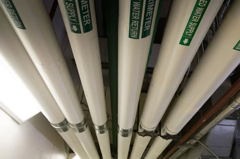 Insulated chilled-water supply and return piping at the ACTC Main Building renovation in Ashland, Kentucky.