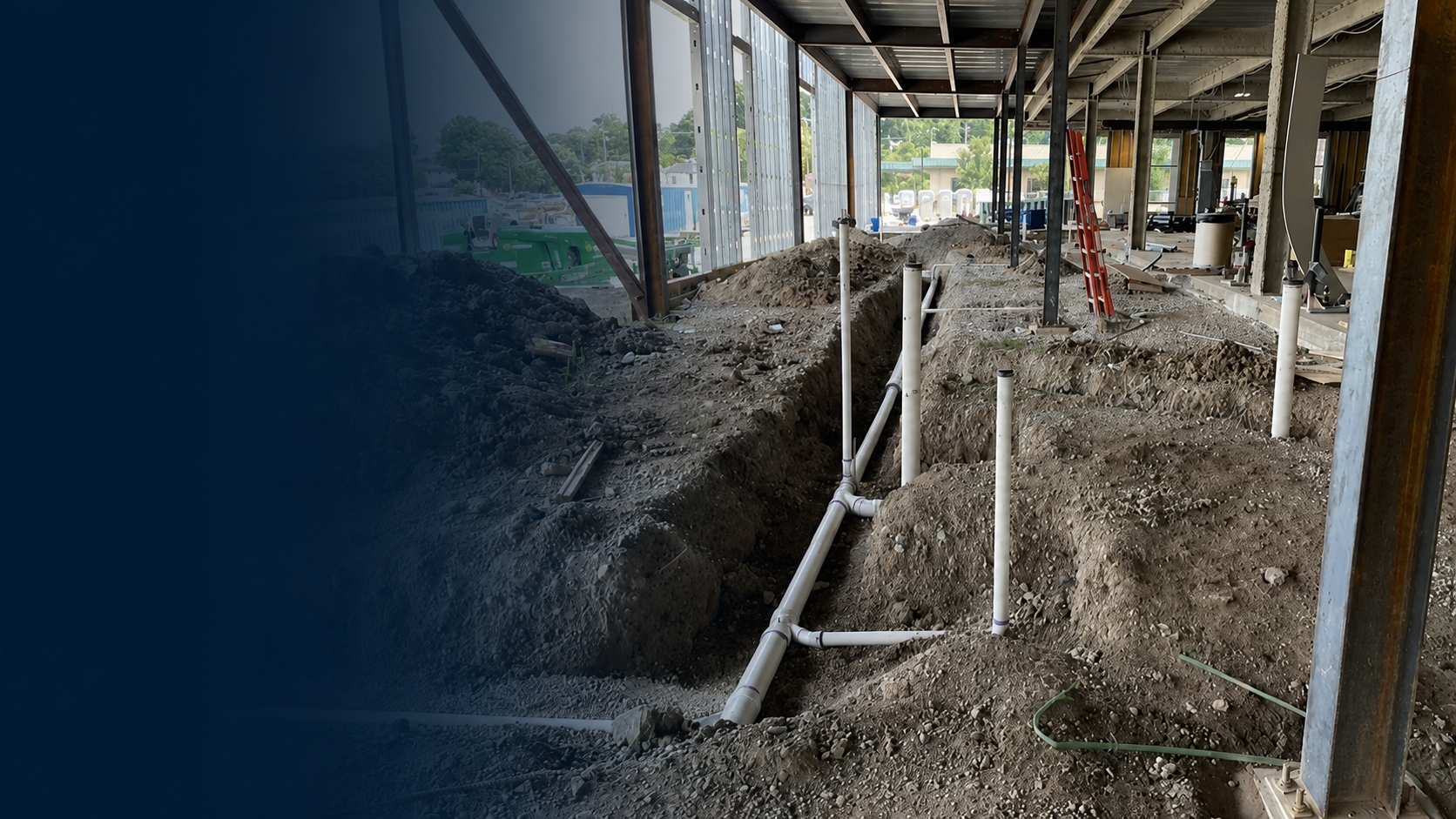 Commercial underground plumbing rough-in during construction by CIMCO.