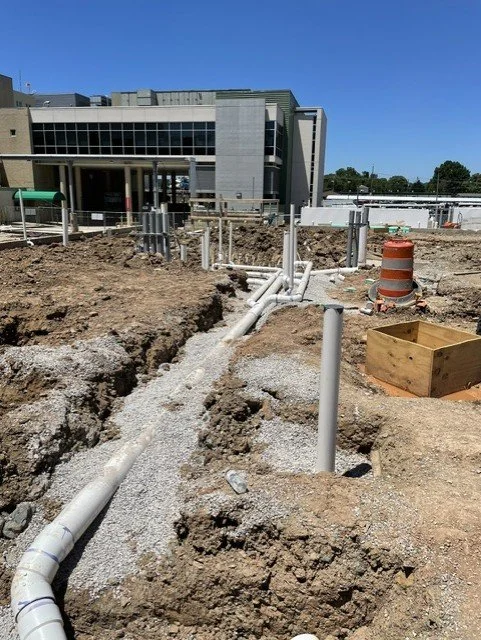 Underground plumbing piping installed at the Robert & Lena Shell Medical Pavilion during construction.