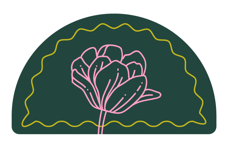 Neon sign of a pink flower with green leaves and a yellow border on a dark background.