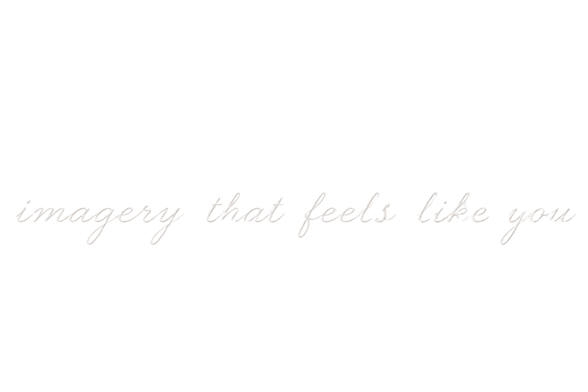 A cursive neon sign reads that everything has feel, life, and love.