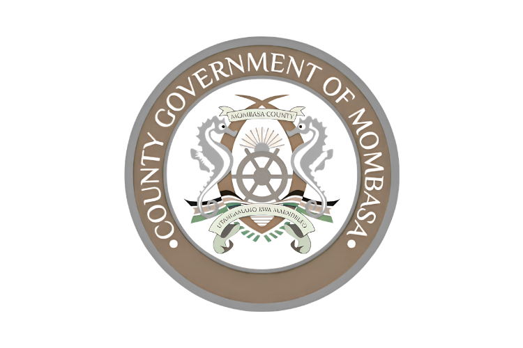 The official seal of the County Government of Mombasa, featuring a circular design with the county's name, a seashell, two lions holding a shield, and a banner with the motto.