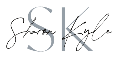 Stylized text with the words "Sharon Kyle" written in cursive, overlaying a large, light gray "S" and "K".