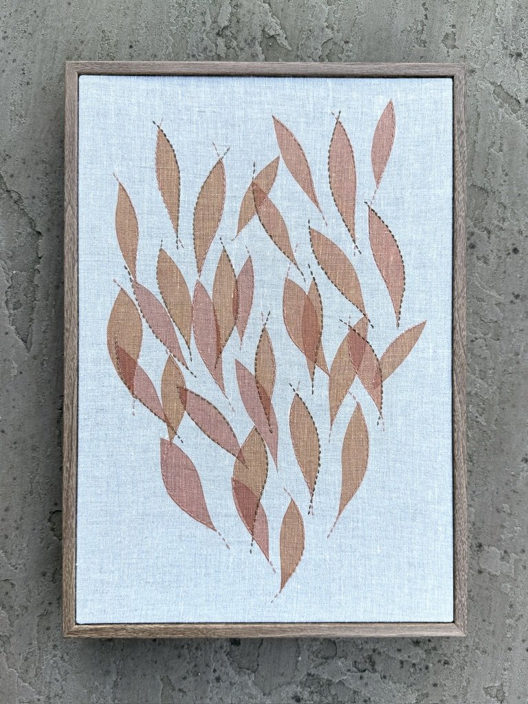Linen screen printed with handmade madder ink print paste and hand embroidered